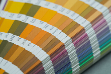 Palette of color shades. A sample of the chromaticity of the colors system. Reference colors of paints. Selective focus