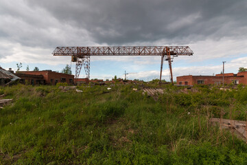 gantry crane in the summer in the grass