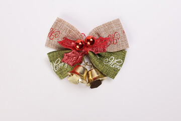 Small Christmas xmas gift bow ribbon Pine Arrangement bell on white background copy text space