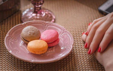 macarons with hands