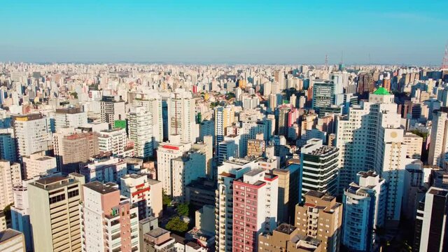 Great view of Sao Paulo city downtown with blue skies and thousands of buildings skyline.
