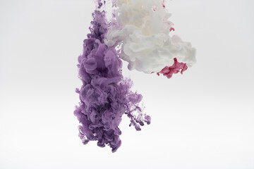 white pink and purple smoke on a white background.