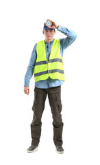 Young male worker with headlamp flashlight on white background