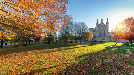 Winchester, England - Nov. 21, 2021. Winchester Cathedral is one of the finest medieval cathedrals in Europe. and the resting place of Saxon royalty, and Jane Austen, the much-loved English novelist. - obrazy, fototapety, plakaty