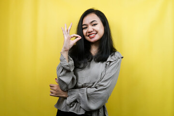 Beautiful young woman with hand ok sign, good job, success sign, victory, advertisement, isolated