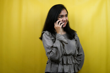 Beautiful young woman calling someone, advertisement, isolated