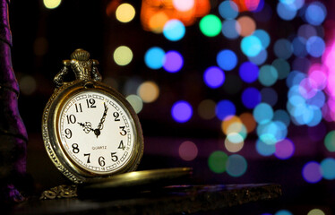 Fototapeta na wymiar new year clock with christmas decorations