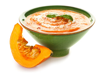 Bowl with delicious pumpkin cream soup on white background