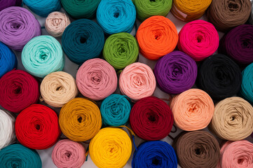 Close-up of multi-colored cotton skeins. Shop assortment for handmade