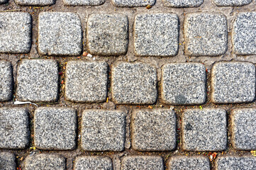 Abstract background of old cobblestone pavement road