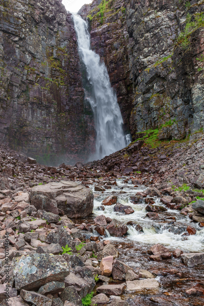 Poster Beautiful waterfall in a mountain canyon