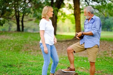 Portrait caucasian senior woman and old man, couple elder in love happy in park