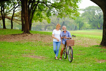 Portrait caucasian senior woman and old man, couple elder in love happy in park