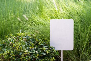 Blank white banner in the garden