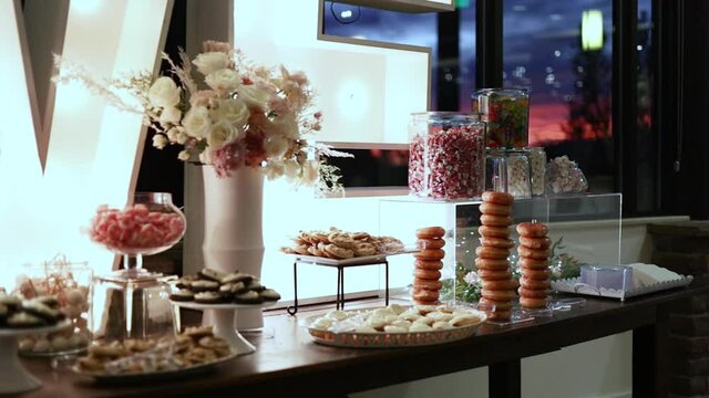 Elegant Food and Dessert Table Display at Wedding Reception Event