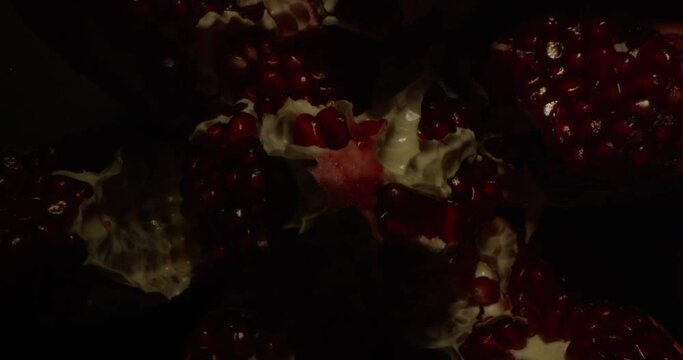 Inside of an Opened Pomegranate Fruit with Changing Light
