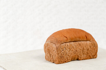 Choco bread loaf on a white background. Chocolate flavor