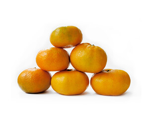 Pyramid of tangerines, isolated on a white background. Delicious and healthy citrus tropical fruit. Six ripe tangerines.