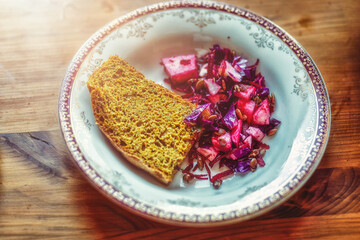 fresh bread and vegetable on a wooden background, healthy food.