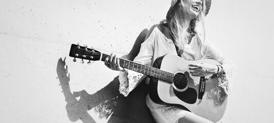 Beautiful singer songwriter with her guitar