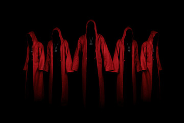 Group of mystery people in a red hooded cloaks.  Unrecognizable person. Hiding face in shadow. Ghostly figure. Satanic sect member. Conspiracy concept. Isolated on black. - 470808026