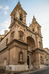 Fototapeta na wymiar View at the Church of Stella Maris in the streets of Sliema - Malta