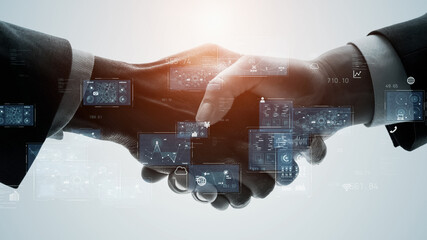 Business and technology concept. Shaking hands. GUI (Graphical User Interface).
