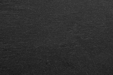 Dark grey black slate background or texture.