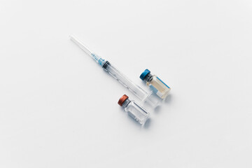 injection with a syringe, Healthy penis concept. syringe and two vials of vaccine on white...