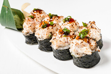 tasty sushi with fresh fish and vegetables