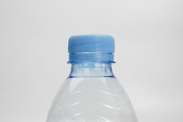 Close up of blue bottle cap isolated with white background. Plastic bottle cap