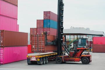 Work in the container yard and the car is lifting. Cargo container in the cargo yard