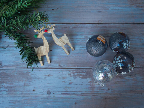Wooden reindeer and blue balls christmas decoration