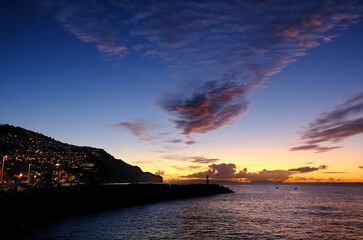 Naklejka na ściany i meble First light and clouds, Funchal, Madeira