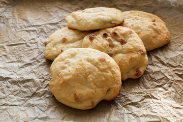 Dessert from cottage cheese with raisins. Cottage cheese pancakes baked in the oven.