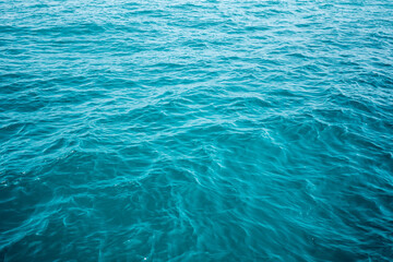 Fototapeta na wymiar Dark blue waves in the water 