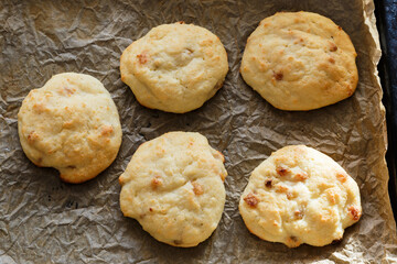 Dessert from cottage cheese with raisins. Cottage cheese pancakes baked in the oven.