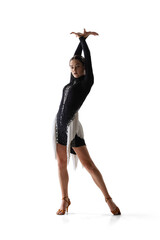 Full-length portrait of young graceful beautiful dancer, flexible woman dancing ballroom dance isolated on white studio background.