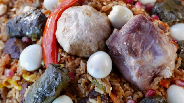 Uzbek plov with eggs and dolma