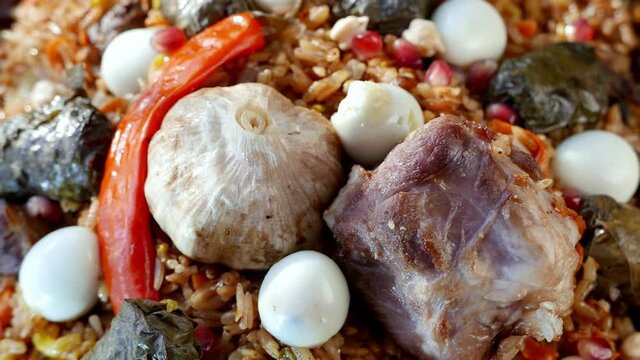 Uzbek plov with eggs and dolma