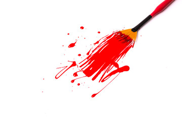 Paint brush with red paint stroke isolated on white background.