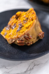 Chocolate pumpkin bundt cake with toffee glaze