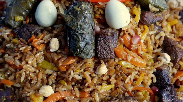 Uzbek plov with eggs and dolma
