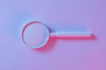 Studio close-up from above of an old magnifying glass