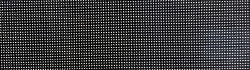 照明に照らされて浮かび上がったガラスの模様。