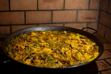 
preparation of typical Valencian paella