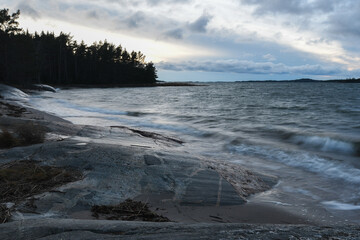 Waves in the archipelago at dusk in the fall