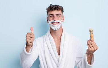 handsome hispanic man shaving with foam