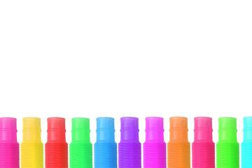 Colorful trendy toys pop tubes on a white background. Design elements. Place for text