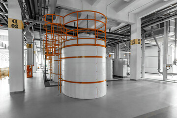 Photo of pipes and tanks. Chemistry and medicine production. Pharmaceutical factory